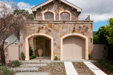 Inspiration for a timeless two-story stone house exterior remodel in San Francisco