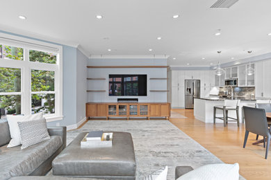 Inspiration for a large contemporary open concept family room remodel in New York