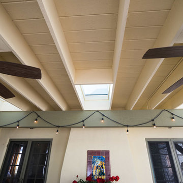 Full Shade Patio Cover Featuring Skylights and Ceiling Fans