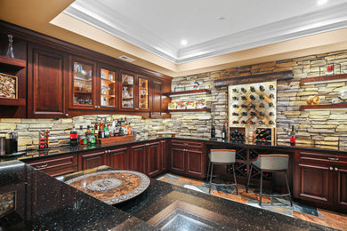 Example of a tuscan home bar design in Baltimore