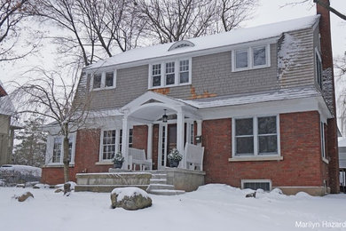 Traditional two-story mixed siding exterior home idea in Grand Rapids