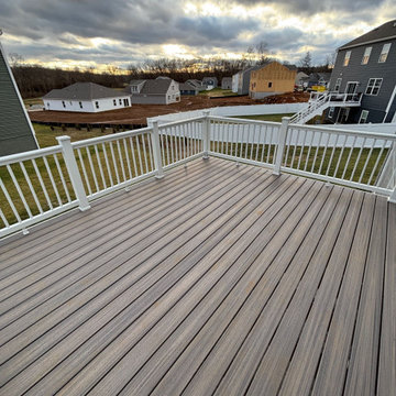 Trex Enhance Gray Deck and Shaded Gray Jefferson Paver Patio