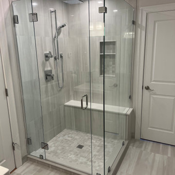 Frameless Glass Shower Enclosure with Bench