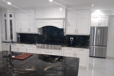 Example of a transitional kitchen design in Toronto