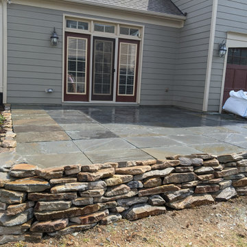 Bluestone Patio, Privacy Fence, and Dry-Stack Retaining Terrace