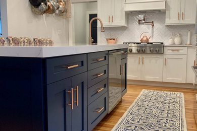 Inspiration for a coastal kitchen remodel with an island