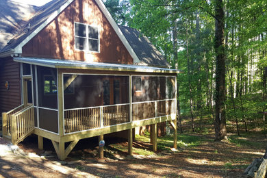 Mountain style front porch photo in Other