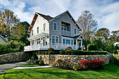 Mid-sized craftsman gray three-story wood exterior home idea in Boston with a gambrel roof