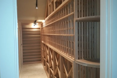 Inspiration for a timeless wine cellar remodel in Austin