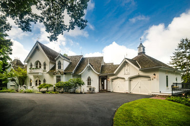 Large eclectic white two-story wood exterior home idea in Indianapolis with a shingle roof
