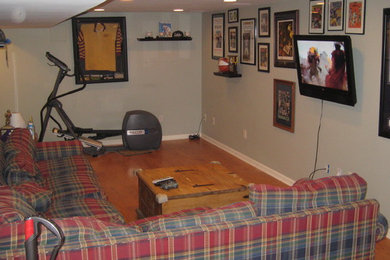 Example of a mid-sized classic home design design in Baltimore