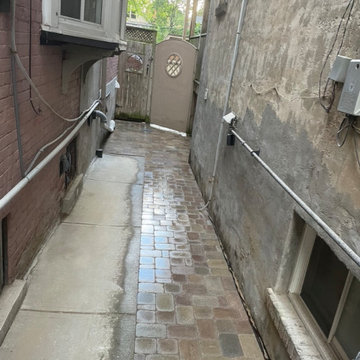 New hardscape stone paver pathway with drain installation