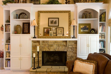 Example of a mid-sized classic enclosed carpeted family room design in DC Metro with yellow walls, a standard fireplace, a stone fireplace and no tv