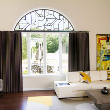 Tableaux grill for the arch window and functional panels for a Greenwood home