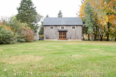 Mid-sized country wood gable roof photo in Philadelphia