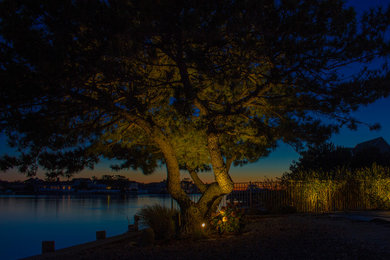 This is an example of a coastal backyard landscaping in New York.