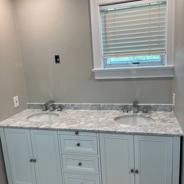 Transformative Bathroom Renovation with Walk-In Shower by Sun Shore Construction