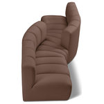 Meridian Furniture - Arc Vegan Leather Upholstered 4-Pc. Facing Modular Sectional, Brown - Unleash modern opulence with the Arc Vegan Leather 4pc. Sectional. Crafted for the modern connoisseur, this Sectional injects an air of refined luxury into any space. Its sleek silhouette, upholstered in supple brown vegan leather, exudes timeless sophistication while the deep channel tufting adds textural intrigue, further elevating the chair's visual appeal. The modular design makes it a versatile chameleon, effortlessly adapting to your evolving needs and preferences. Whether you envision it gracing a chic living room corner, basking in the glow of a bedroom window, or adding a touch of drama to a home office, the Arc seamlessly complements your unique interior aesthetic.