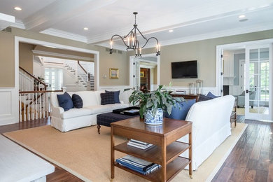 Large elegant enclosed dark wood floor living room photo in Chicago with beige walls, a two-sided fireplace, a stone fireplace and no tv
