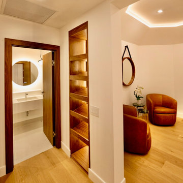 Walnut Built-Ins and Ensuite Bath Entry