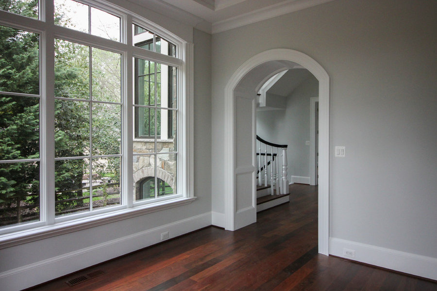 Powerful Impression by Floating Staircase in Suburban Foyer