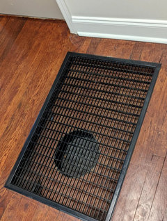 A C Floor Return Vent Partially Ered