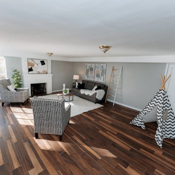 Lower-Level Rec Room with New Flooring - Sand Point Rebuild