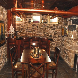 Photo of a victorian basement in Philadelphia with grey floors.