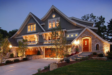 Example of a classic gray three-story wood gable roof design in Minneapolis