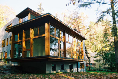 Inspiration for a large modern gray two-story mixed siding exterior home remodel in Seattle
