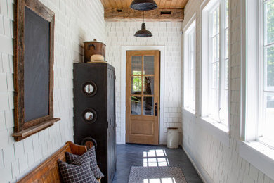 Inspiration for a farmhouse entryway remodel in Toronto