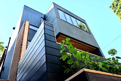 Example of a minimalist exterior home design in Toronto