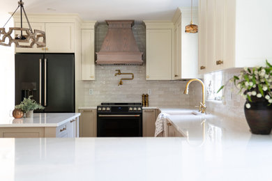 Example of a classic kitchen design in Portland Maine with white countertops