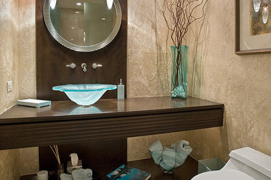 Mid-sized minimalist 3/4 beige tile and travertine tile travertine floor and beige floor alcove shower photo in Chicago with a one-piece toilet, beige walls, a vessel sink, wood countertops, open cabinets, dark wood cabinets and a hinged shower door