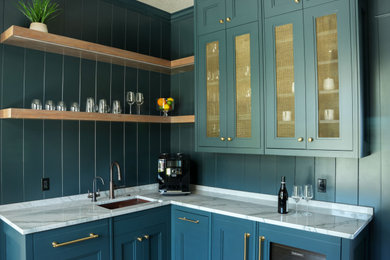 Inspiration for a mid-sized contemporary medium tone wood floor and brown floor wine cellar remodel in Detroit