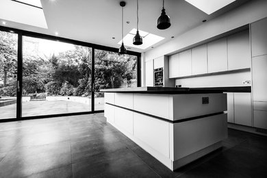 This is an example of a large contemporary kitchen in Cardiff.