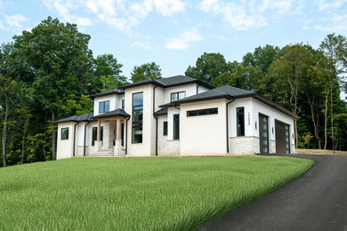 Large contemporary white two-story exterior home idea in Cleveland