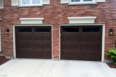 Mountain style two-car garage photo in Chicago