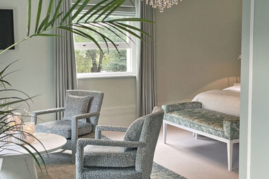 Design ideas for a large traditional master bedroom in Essex.