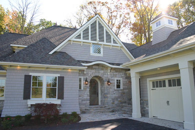 Inspiration for a transitional exterior home remodel in Grand Rapids