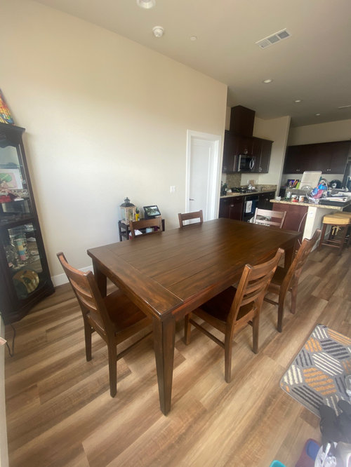 Brand new dining room, rug or no rug?