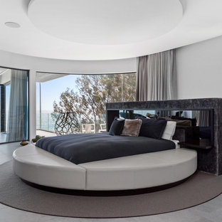Photo of a contemporary bedroom in Perth with grey walls and grey floor.