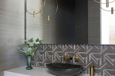 Inspiration for a mid-sized contemporary wallpaper powder room remodel in Dallas with white cabinets, gray walls, a vessel sink and a floating vanity