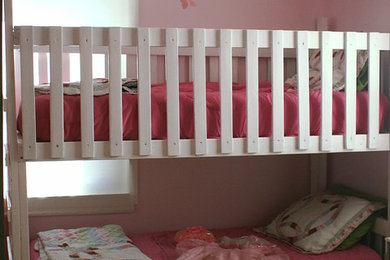 Trendy girl kids' room photo in Toronto with pink walls