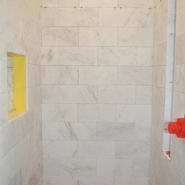 This is Picture 2 of 4 showing the installation of a Carrara Venato Bathroom