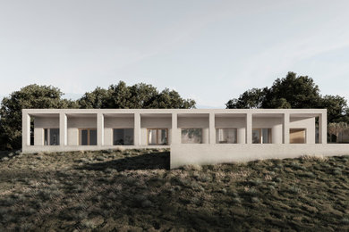 Inspiration för stora moderna beige hus, med allt i ett plan, tegel, platt tak och tak i metall