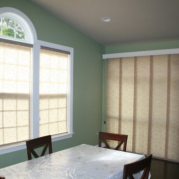 Simple Solutions in Window Treatments -Panel Track shades and Roller shades