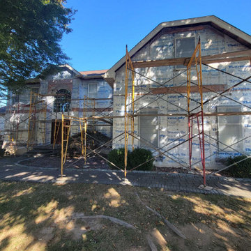 Stucco remediation with siding and windows installation, sheathing replacement