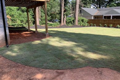 SOD GRADING AND PLANTINGS