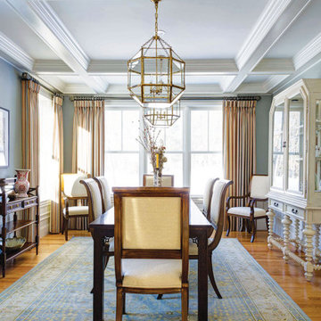 Family pieces mixed with transitional Jacobean china cabinet & pair of lanterns